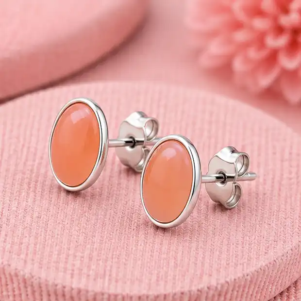 Gyary Peach Glow Oval Stud Earrings